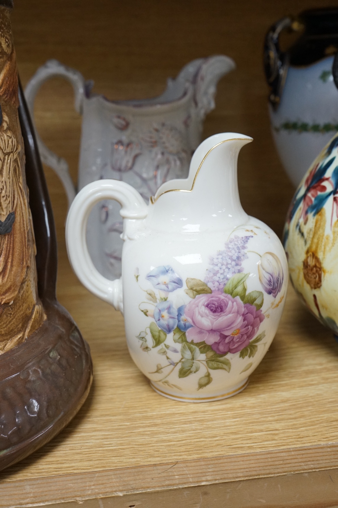 A collection of seven various ceramic vessels including Bretby, Poole, Worcester, continental art pottery etc. 26cm